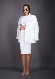 Front view of model wearing 3-in-1 linen set: jacket, skirt, and top, East Vibe